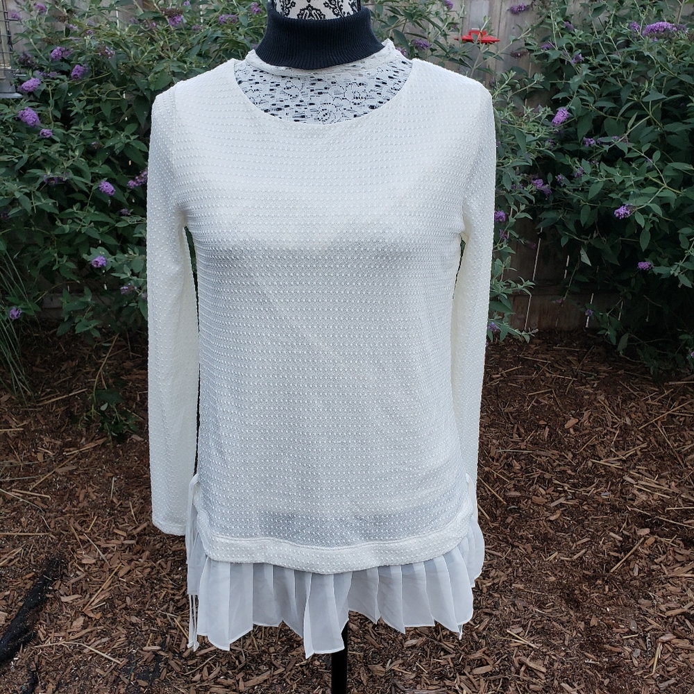 Womens tunic with pleated hem